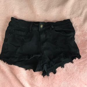 Black ripped shorts